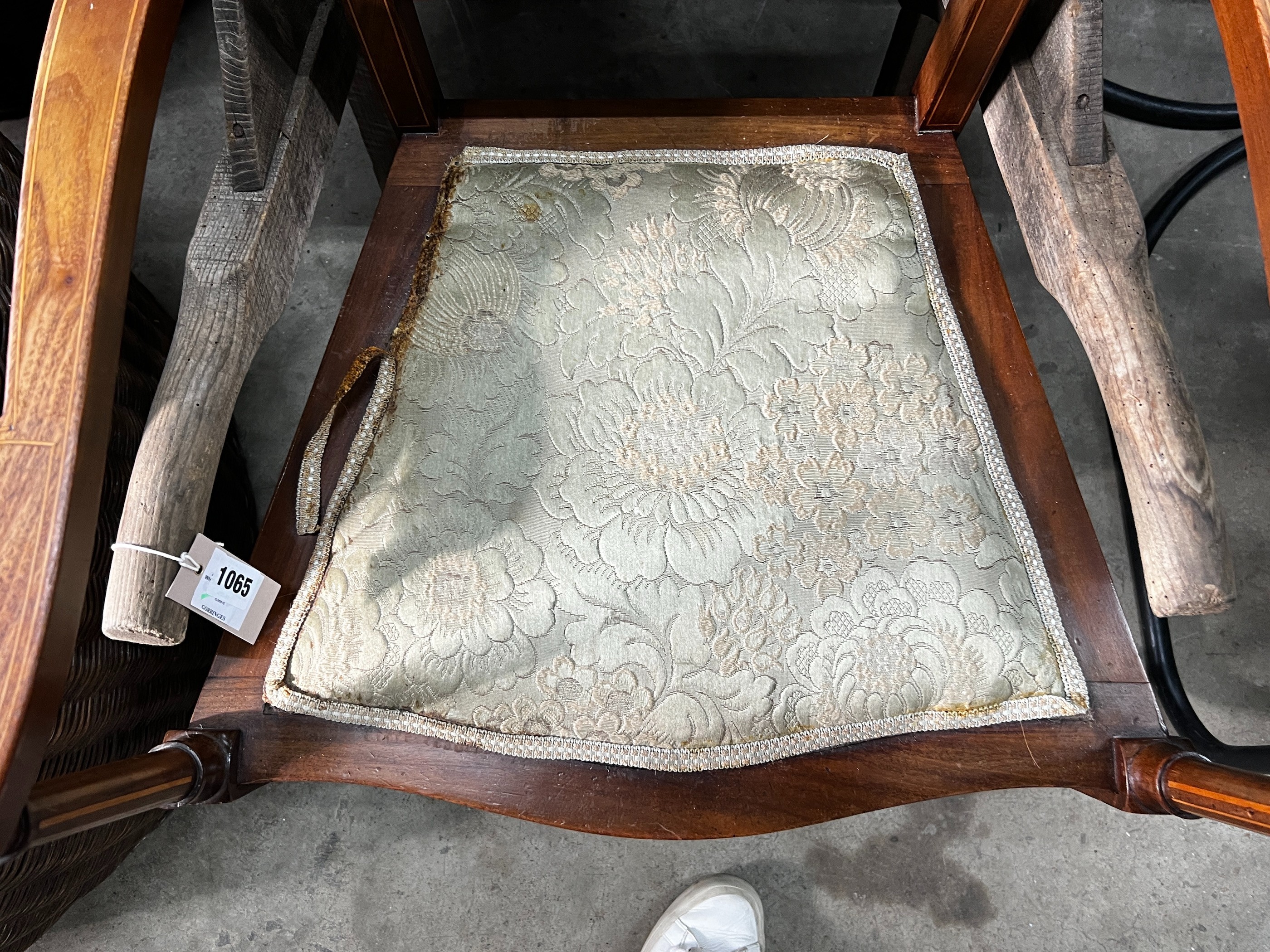 An Edwardian inlaid mahogany elbow chair, width 63cm, depth 44cm, height 122cm